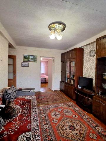 Продам четырехкомнатную квартиру