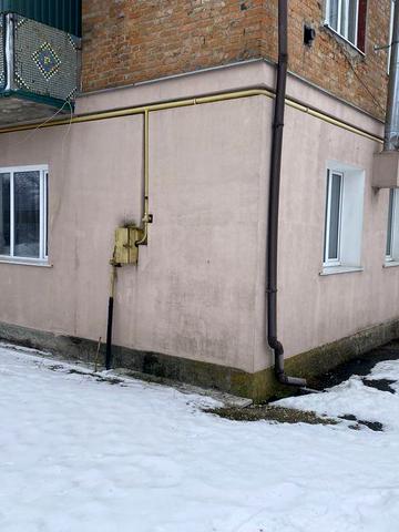 Квартира з земельною ділянкою!