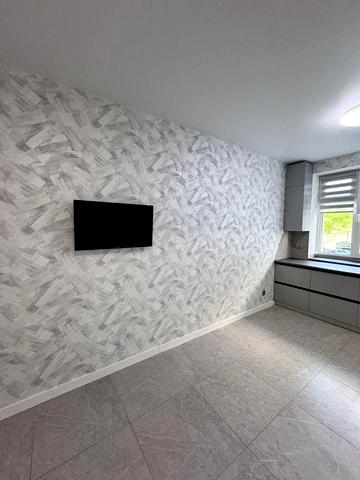 Агора, забудовник Комунбуд