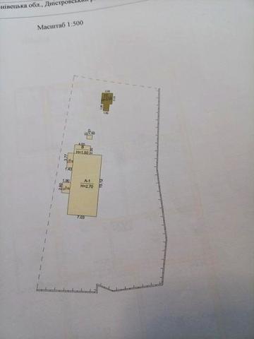 Будинок в центрі, Хотин