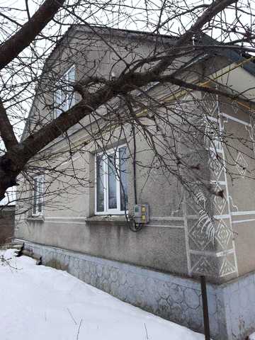 Будинок з земельною ділянкою
