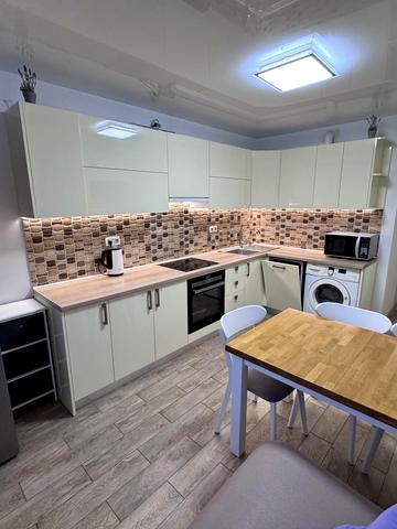 Юрія Поправки вул. (Миколи Лебедєва), 14