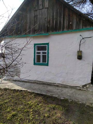 Хата в селі Росава