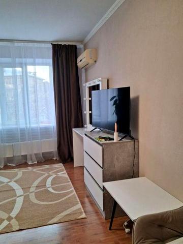 Можна з  собачкою.Центр