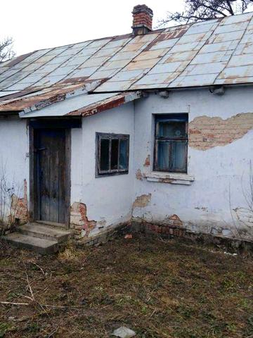 Продаж житлового будинку з ділянкою 0,25 га