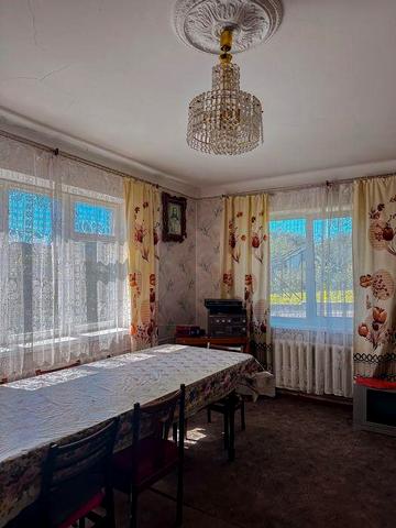 Продаж 1/2 будинку з окремою приватизованою землею в районі Червоних Гір. Вул.Рівненська