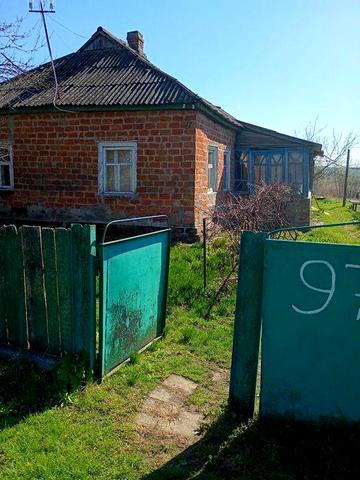 Земельна ділянка з будинком