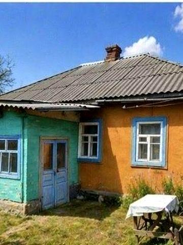Продам будинок з господарськими будівлями та городом в с. Онищенки.