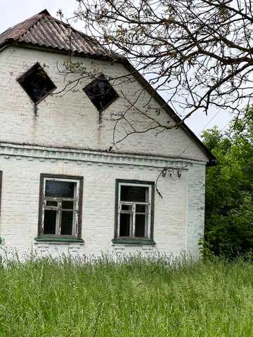 Цегляний будинок з земельною ділянкою. Дім