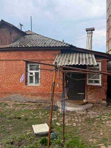 Власна квартира + подвір’я та сараї (центр, вул. Гімназична)