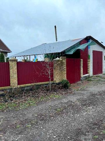 Житловий  будинок та земельна ділянка 0,1 га Київська обл,  м.Фастів, Квітнева,75