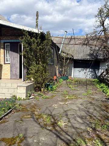 Продається затишний будинок м.Радомишль, Житомирської області. Від Києва - 95 км, від Житомира - 70 км.