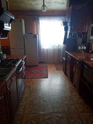 Продам часину будинка в центрі Зміїва