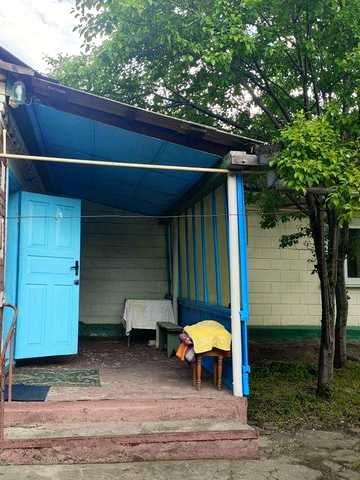 Житловий будинок, земельні ділянки, два окремих входа