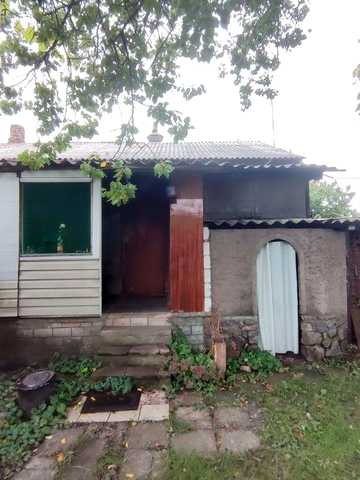 Частина панського  будинка з землею в центральній частині Конотопа Власник