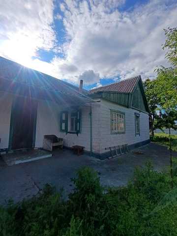 Продам будинок із гаражем в Аулах!
