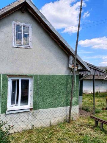 Продається земельна ділянка з будинком