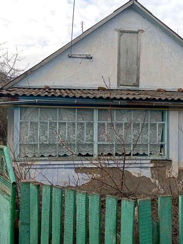 Приватний будинок з земельною ділянкою