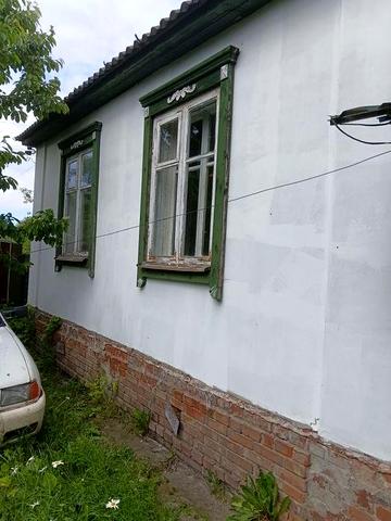 Житловий будинок з присадибною ділянкою