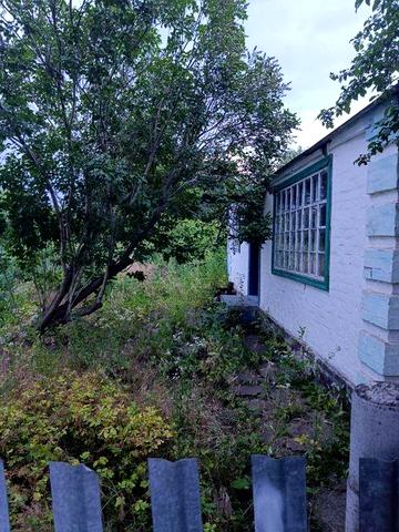 Продам будинок "земельну ділянку" в центрі міста