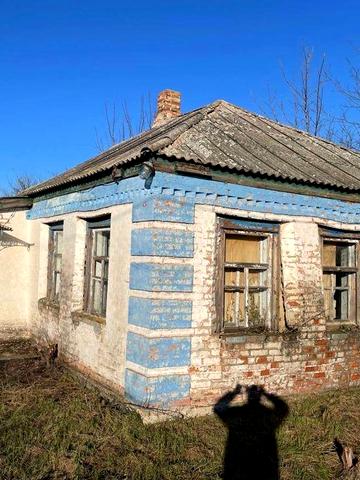 Продам будинок з великим двором та городом  50 соток