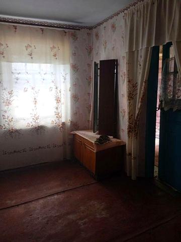 Земельна ділянка з будинком