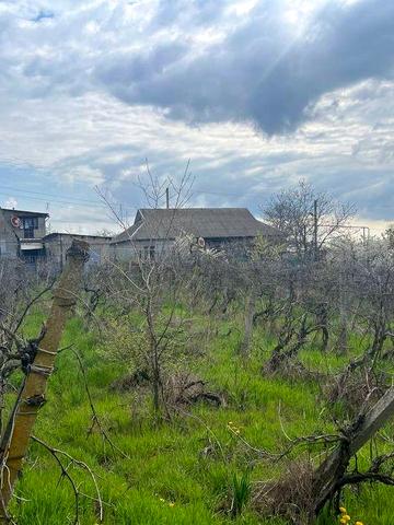 земельна ділянка з будинком