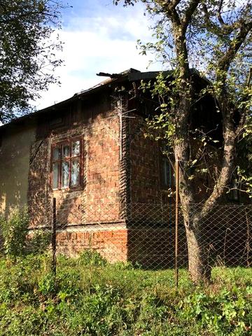 Продається земельна ділянка з будинком у селищі Куликів, 12 км від Львова