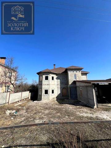 Будинок на Черняхівці біля річки