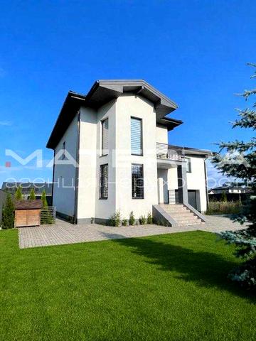 Сучасний котедж 225м² на 9 сотках у закритому містечку. с. Нове