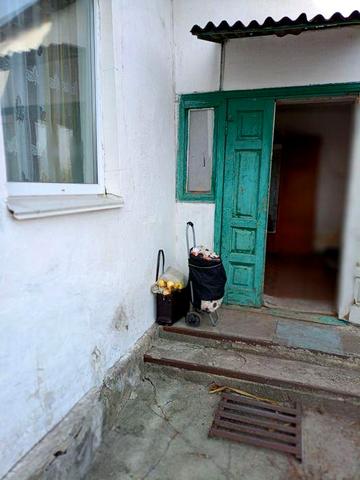 Продаж половини будинку в центрі міста Радомишль 100 км від Києва