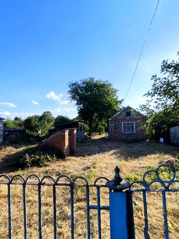 Продам земельну ділянку з будинком