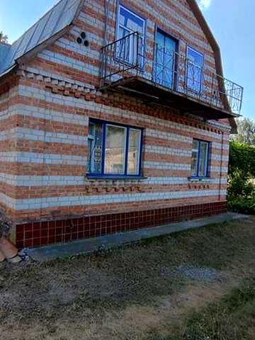 Продам фасадну ділянку з будинком в Корчаку