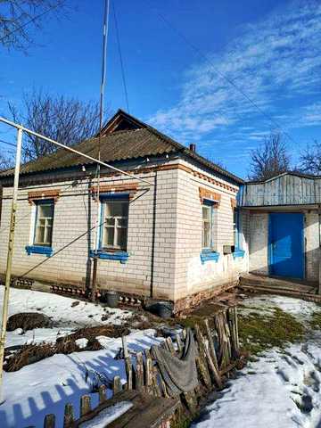 Садиба . Будинок із земельною ділянкою.