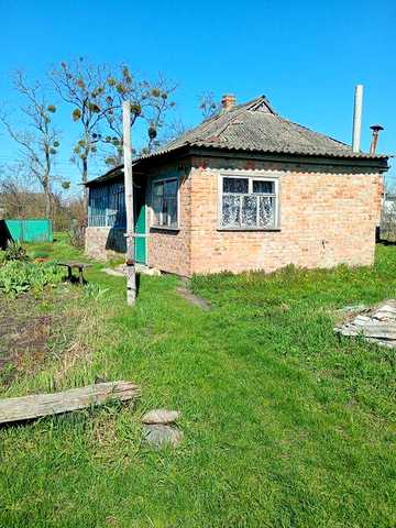 Земельна ділянка з старим будинком біля р.Дніпро