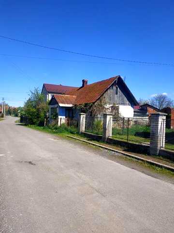 Продається земельна ділянка з будинком