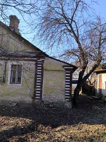 Будинок та земельна ділянка с.Гряди