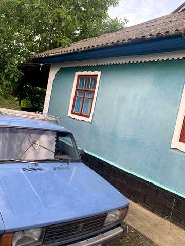 Добротний будинок 100 м² з центральною водою у центрі с. Бабчинці (30 сот