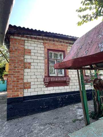 Будинок на скалі біля м-ну Покупайка