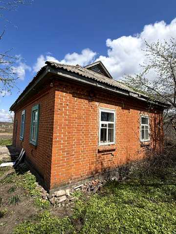 Продам цегляний будинок