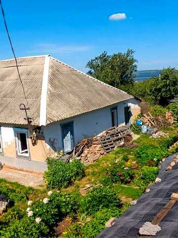 Ділянка 9,5 соток з будинком з панорамним видом на Канівське водосховище в м. Канів