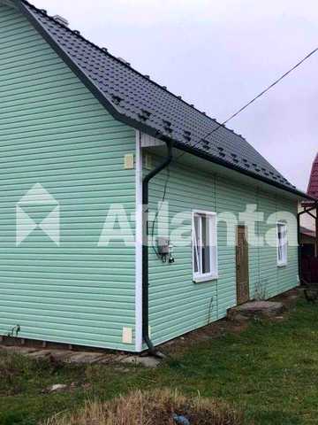 Двохрівневий будинок за містом