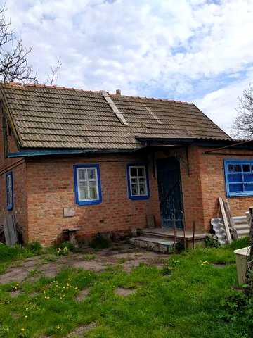 Продам частину будинку з ділянкою 14 соток