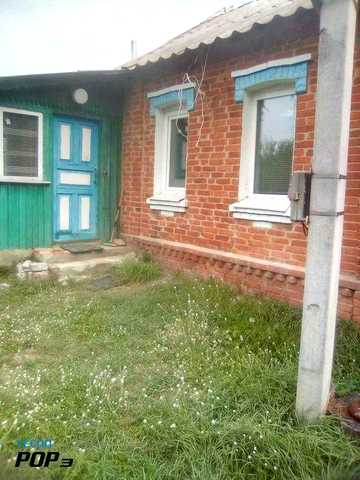 Продам будинок в центрі міста і земельну ділянку м.Валки .