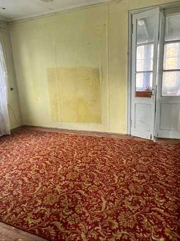 Продається будинок (75.1 кв.м) у м. Коростень з гаражем та ділянкою 14.5 сот. Торг!