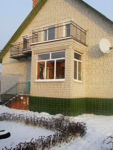 Продам двухэтажный кирпичный дом