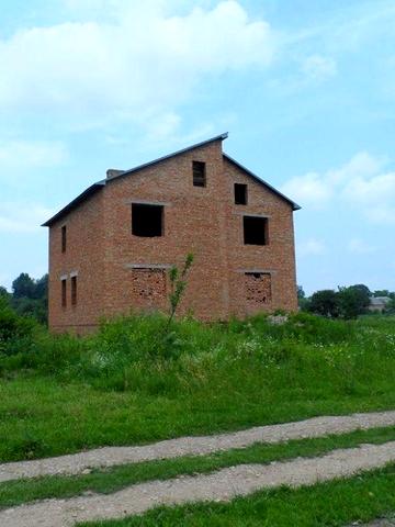 Продається цегляний будинок.