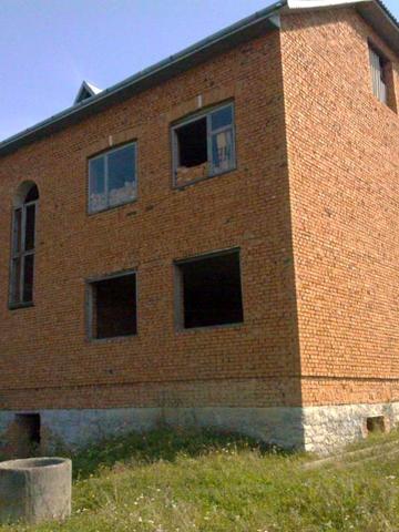 Земельна ділянка з Будинком