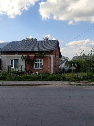 Продаю половину Будинку,цегл гараж та прибуд зем ділянку пл 0.0412Га