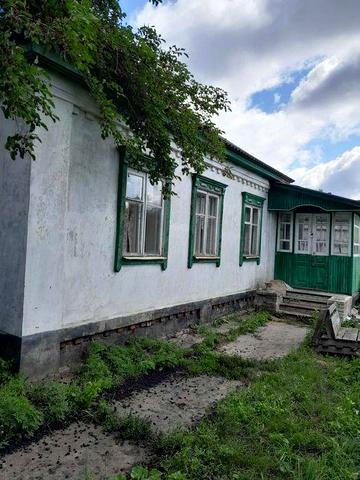 Продам будинок із земельною ділянкою